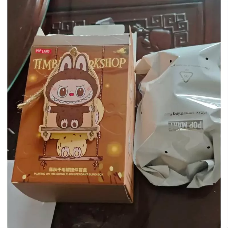 Labubu POP LAND TIMBER WORKSHOP PLAYING ON THE SWING PLUSH PENDANT Series SECRET Dark Brown Labubu POP LAND TIMBER WORKSHOP PLAYING ON THE SWING PLUSH PENDANT Series SECRET Dark Brown